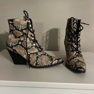 Snake print pointed toe boot